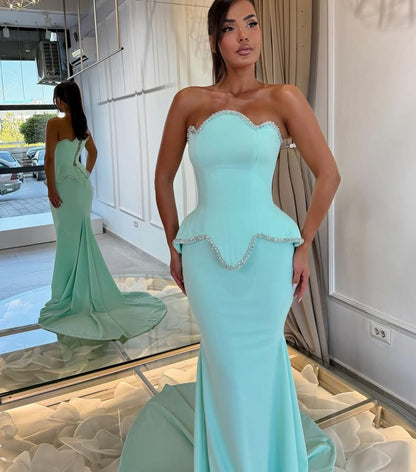 Strapless Scalloped Peplum Mermaid Evening Gown