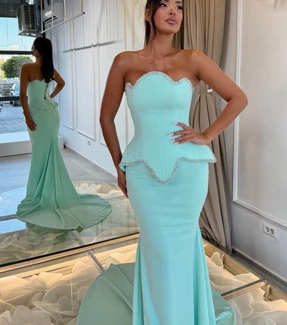Strapless Scalloped Peplum Mermaid Evening Gown